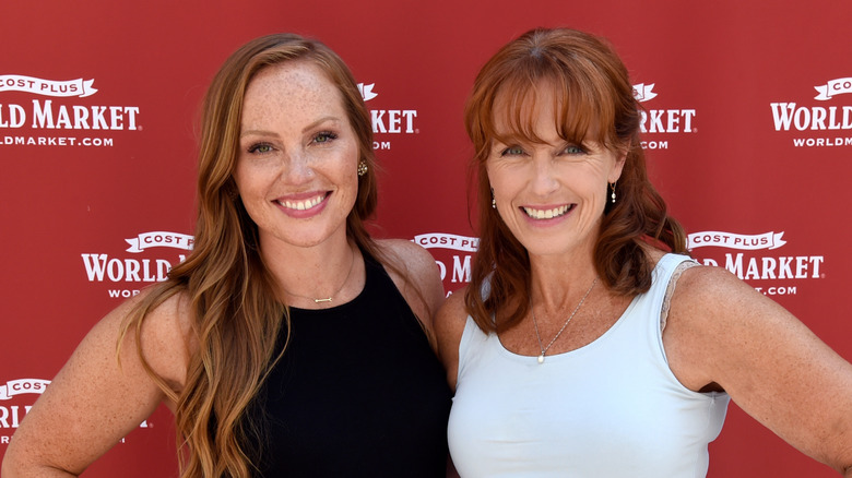 Mina Starsiak Hawk and Karen Laine pose in 2017.