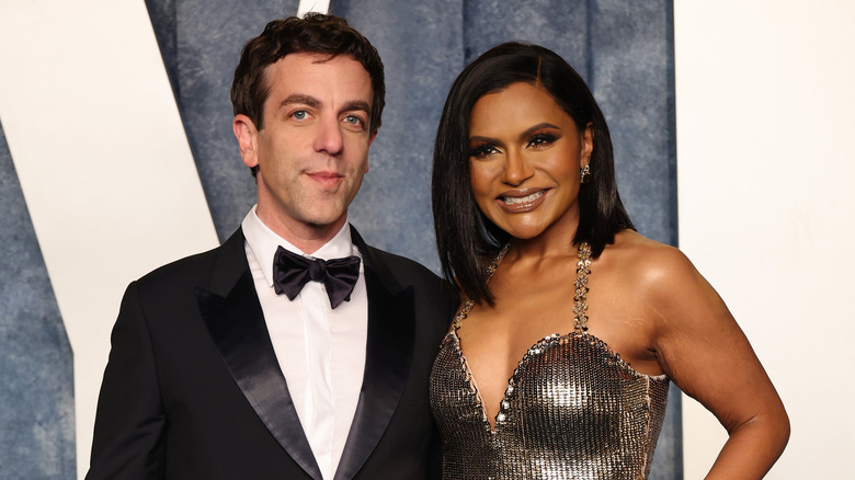 BJ Novak and Mindy Kaling pose together at the 2023 VF Oscars Party.