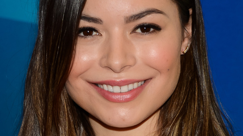 Miranda Cosgrove posing