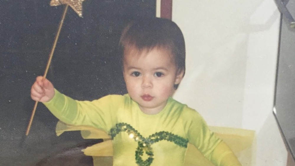 Miranda Cosgrove as a kid in a costume