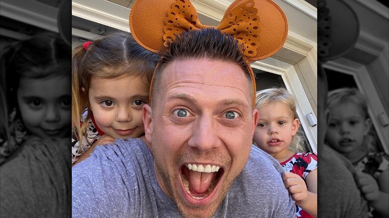 Monroe Mizanin, Mike Mizanin, and Madison Mizanin smiling