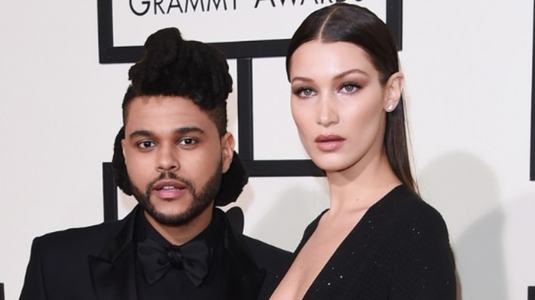 The Weeknd and Bella Hadid posing