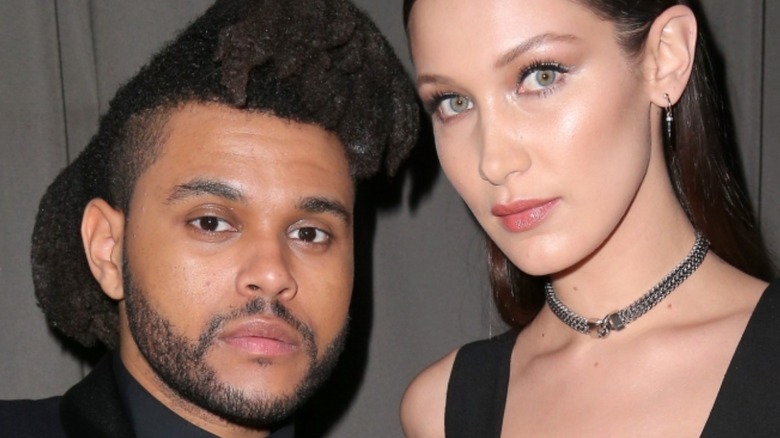 The Weeknd and Bella Hadid posing