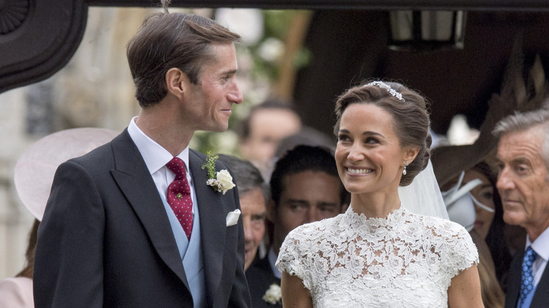 Pippa Middleton and her groom smiling