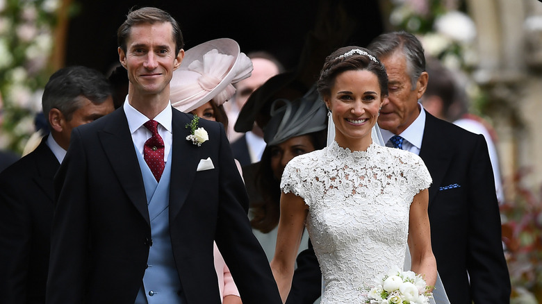 Pippa Middleton and James Matthews holding hands