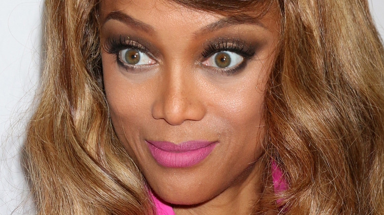 A closeup of Tyra Banks' face