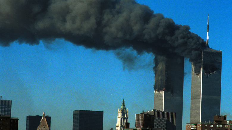 Smoke pouring from the World Trade Center after being hit by two planes September 11, 2001.
