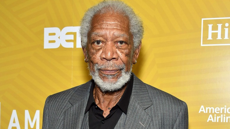 Morgan Freeman stands at red carpet event