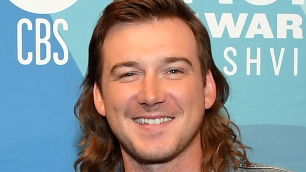 Morgan Wallen posing for photos