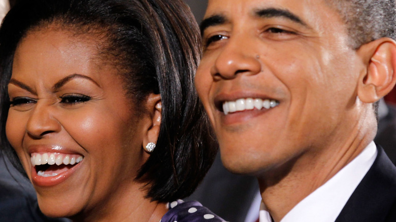 Michelle, Barack Obama laughing 