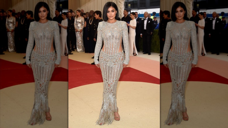 Kylie Jenner posing in Balmain dress