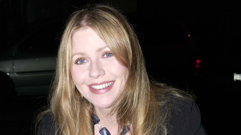 Bebe Buell smiles