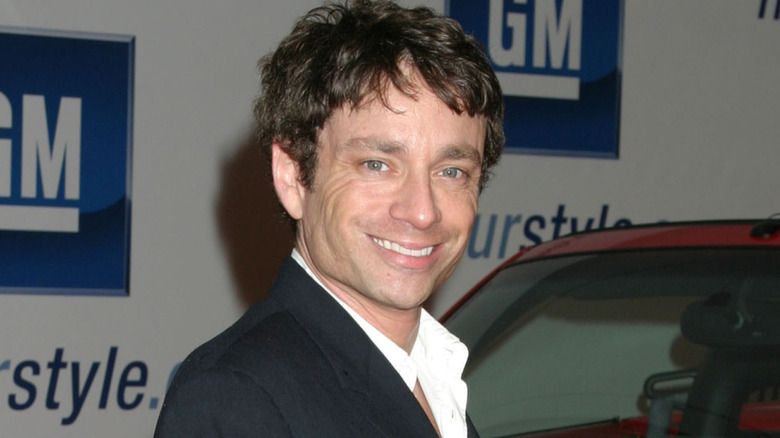 Chris Kattan at an event, smiling