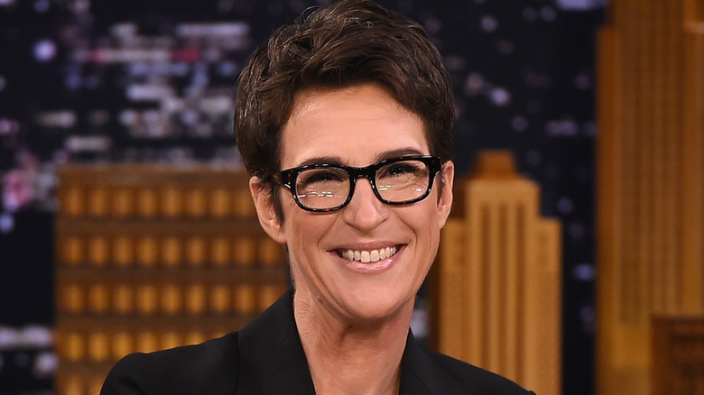 Rachel Maddow in a black jacket