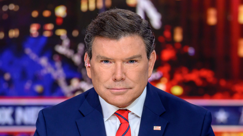 Bret Baier looking down at camera