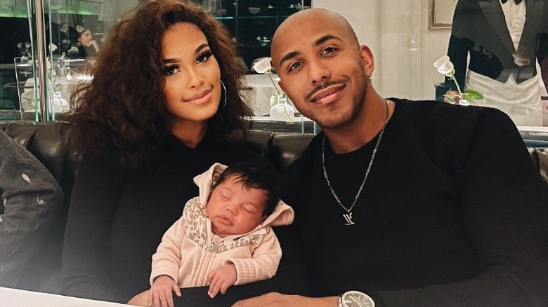 Miya Dickey, Baby Zara, Marques Houston smiling 