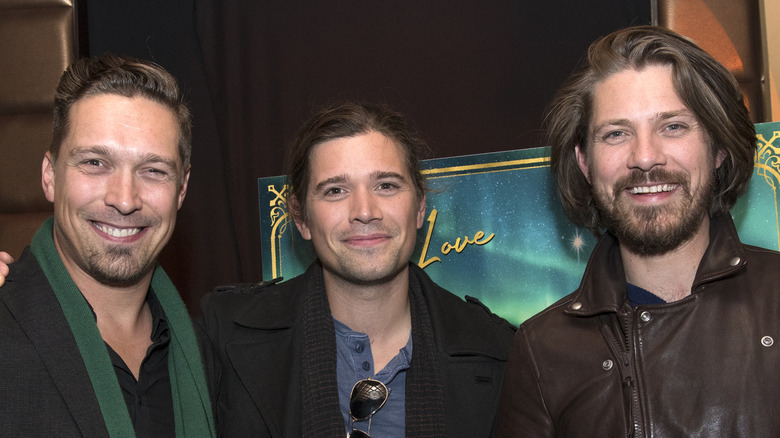 Hanson brothers smiling together