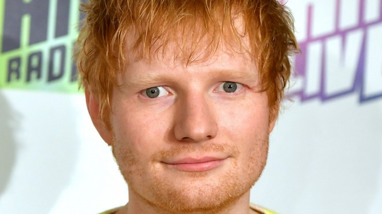 Ed Sheeran grinning