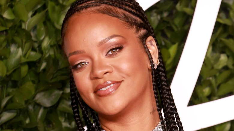 Rihanna with half smile 