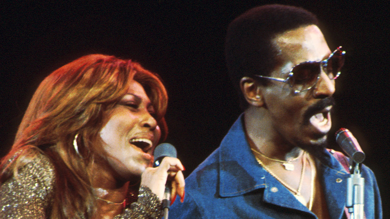 Ike and Tina Turner singing together on stage