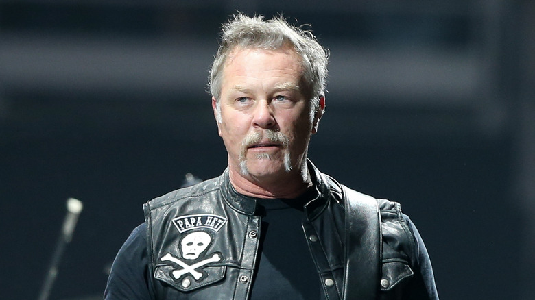 James Hetfield looking side on stage