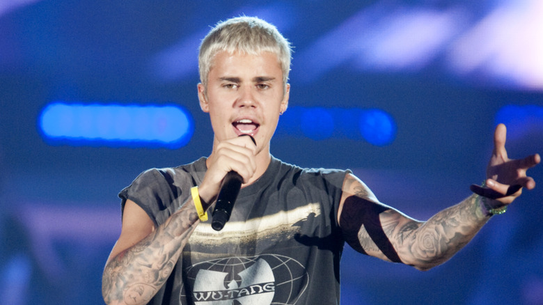 Justin Bieber performs tank top