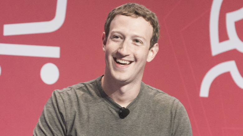Mark Zuckerberg laughing