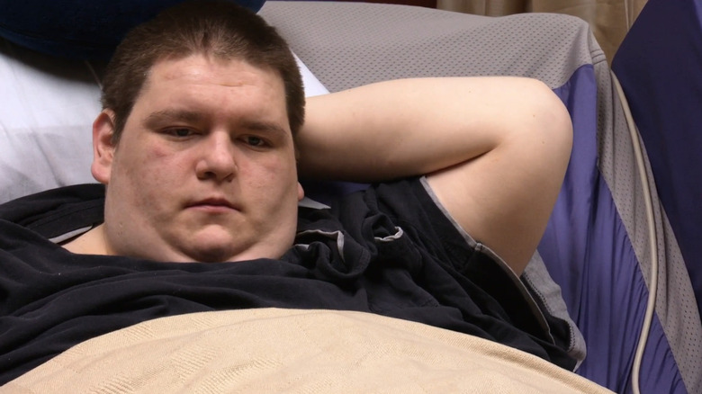 Sean Milliken lying in bed