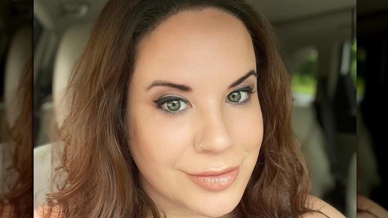 Whitney Way Thore, car selfie, smiling 