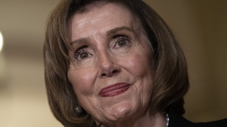 Nancy Pelosi pained smile