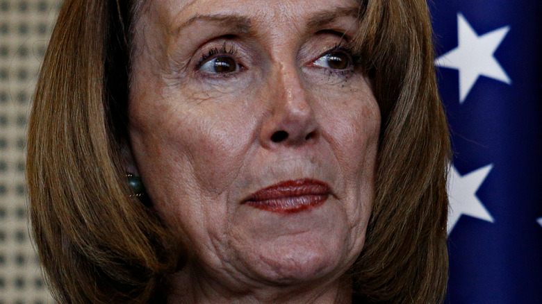 Nancy Pelosi looking upset