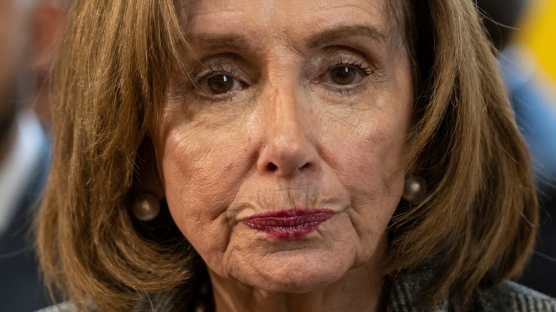 Nancy Pelosi grimacing