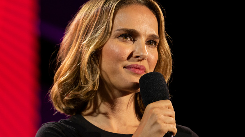 natalie portman holding a microphone