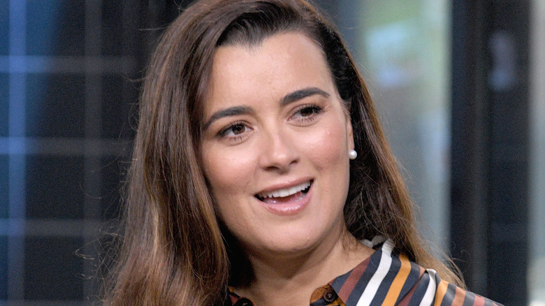 Cote de Pablo speaks at an event
