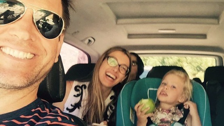 Michael Weatherly and his wife and daughter smiling