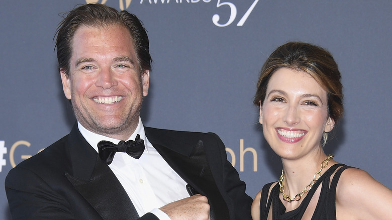 Michael Weatherly poses with his wife
