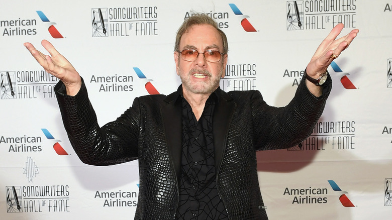 Neil Diamond raised arms