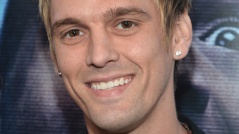 Aaron Carter smiling for photo