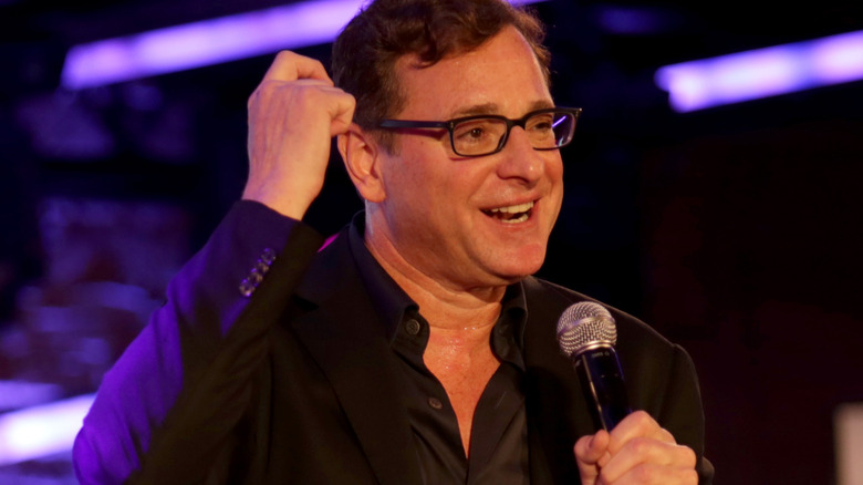 Bob Saget talking on stage