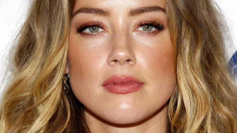 Amber Heard stonefaced 