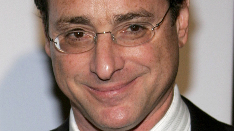 Bob Saget wearing glasses