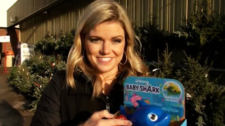 Neena Pacholke holding Baby Shark toy