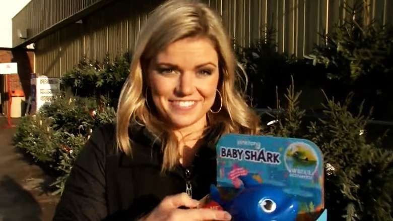 Neena Pacholke holding Baby Shark toy