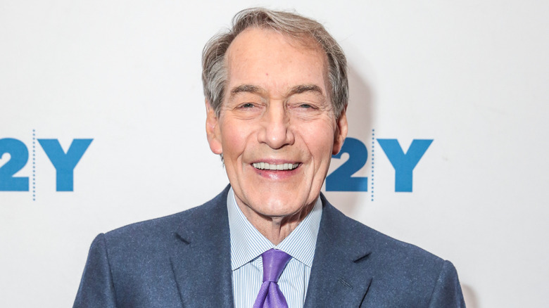 Charlie Rose smiles on a 2017 red carpet