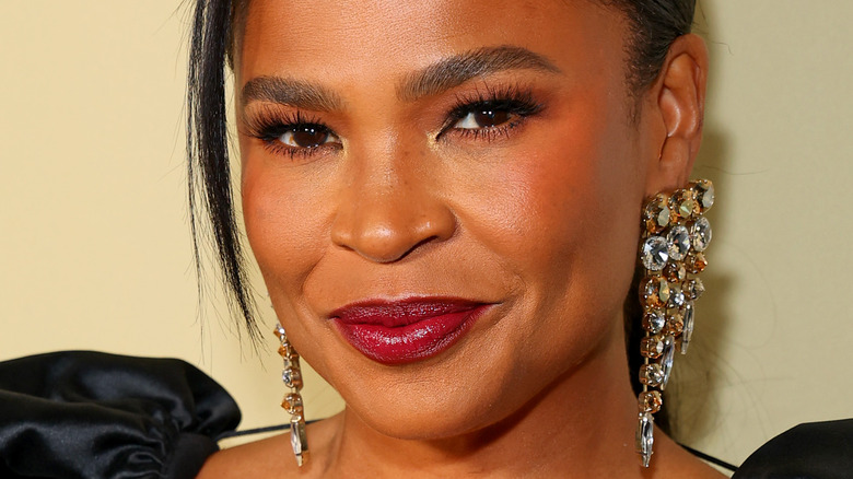 Nia Long smirking