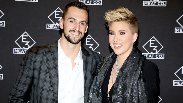 Nic Kerdiles and Savannah Chrisley posing