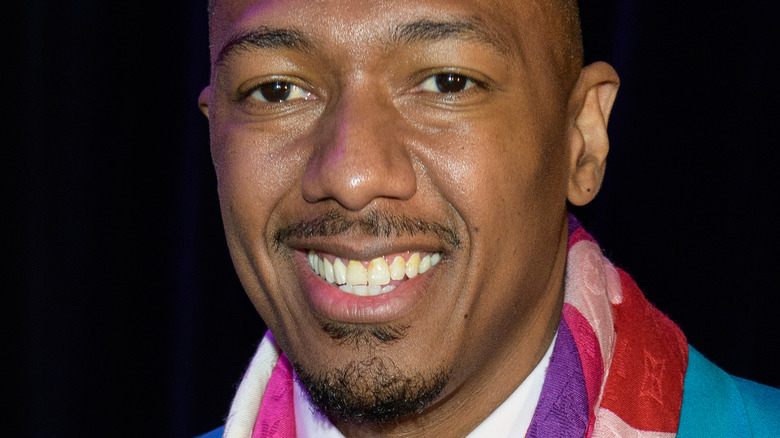 Nick Cannon smiling for cameras 