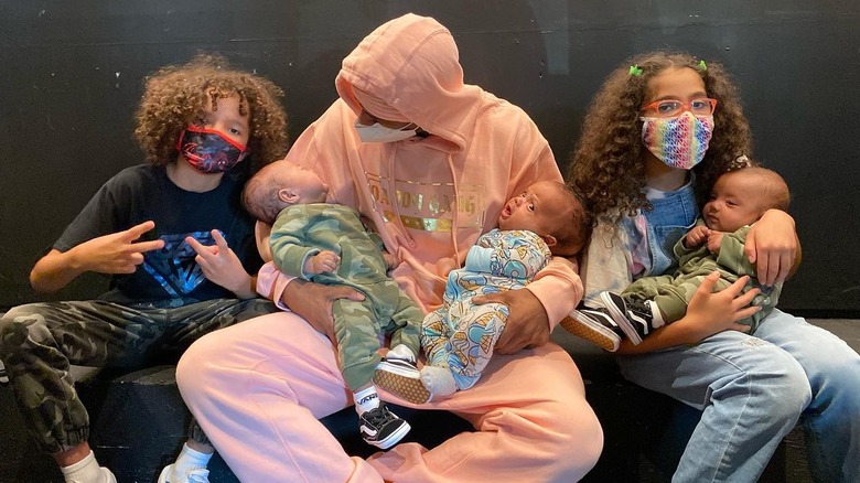 nick canon pictured with five of his kids 