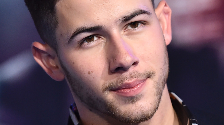 Nick Jonas smiling