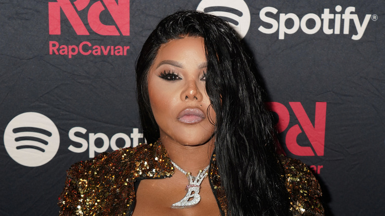 Lil' Kim posing